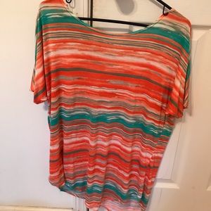 Ladies off the shoulder multi colored tee.